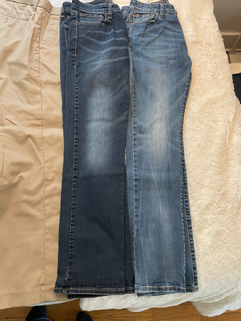 Four pairs of pants. Two dress and two American Eagle jeans.